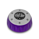 Purple and chrome wheel center cap featuring a black "USA Star" logo on top.