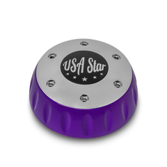 Purple and chrome wheel center cap featuring a black "USA Star" logo on top.
