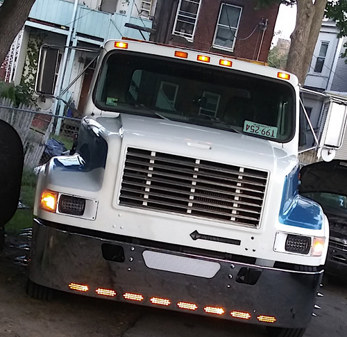 18” Chrome Bumper (International 4700) Wrap Around, W/ Step, Tow & 8 Hidden Light Holes