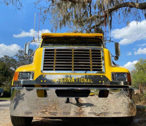 Front 18” Chrome Bumper (International 4700) Wrap Around, W/ Step, Tow & 8 Hidden Light Holes